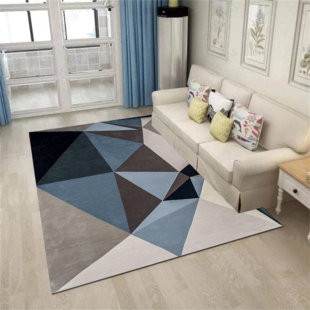 Tableau decoration salon moderne et grand tapis rose brun