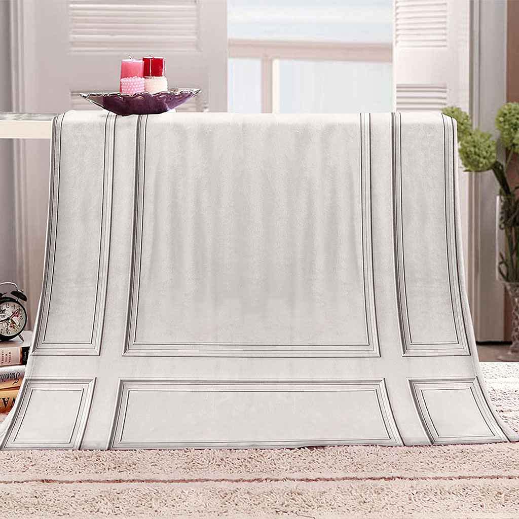 Couverture polaire flanelle au toucher doux et finitions premium