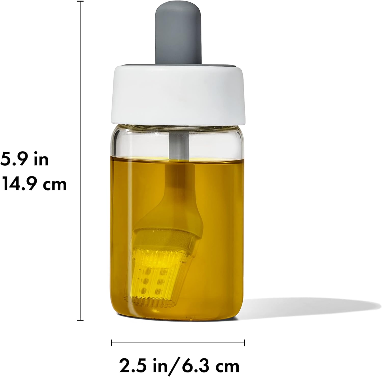 Image displaying the dimensions of the OXO Glass Oil Bottle and Silicone Brush: 5.9 inches (14.9 cm) tall and 2.5 inches (6.3 cm) wide.