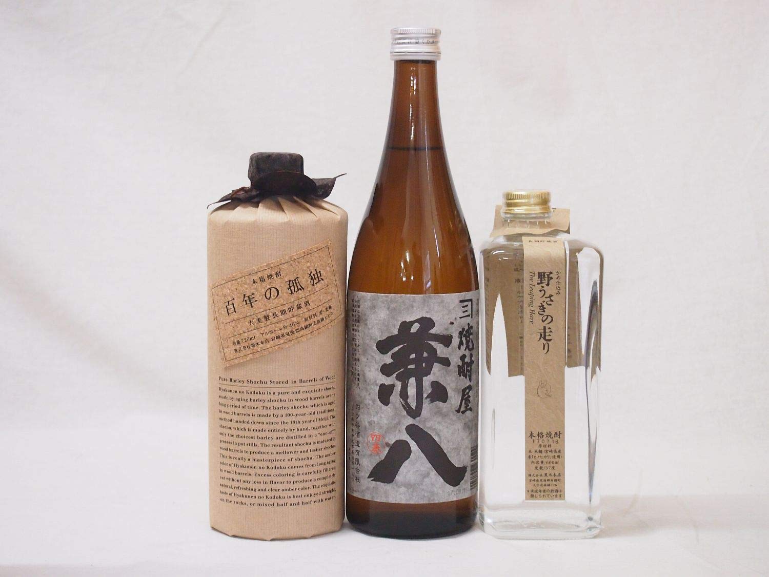 Amazon.co.jp: プレミアム麦焼酎3本セット(百年の孤独 兼八 野うさぎの