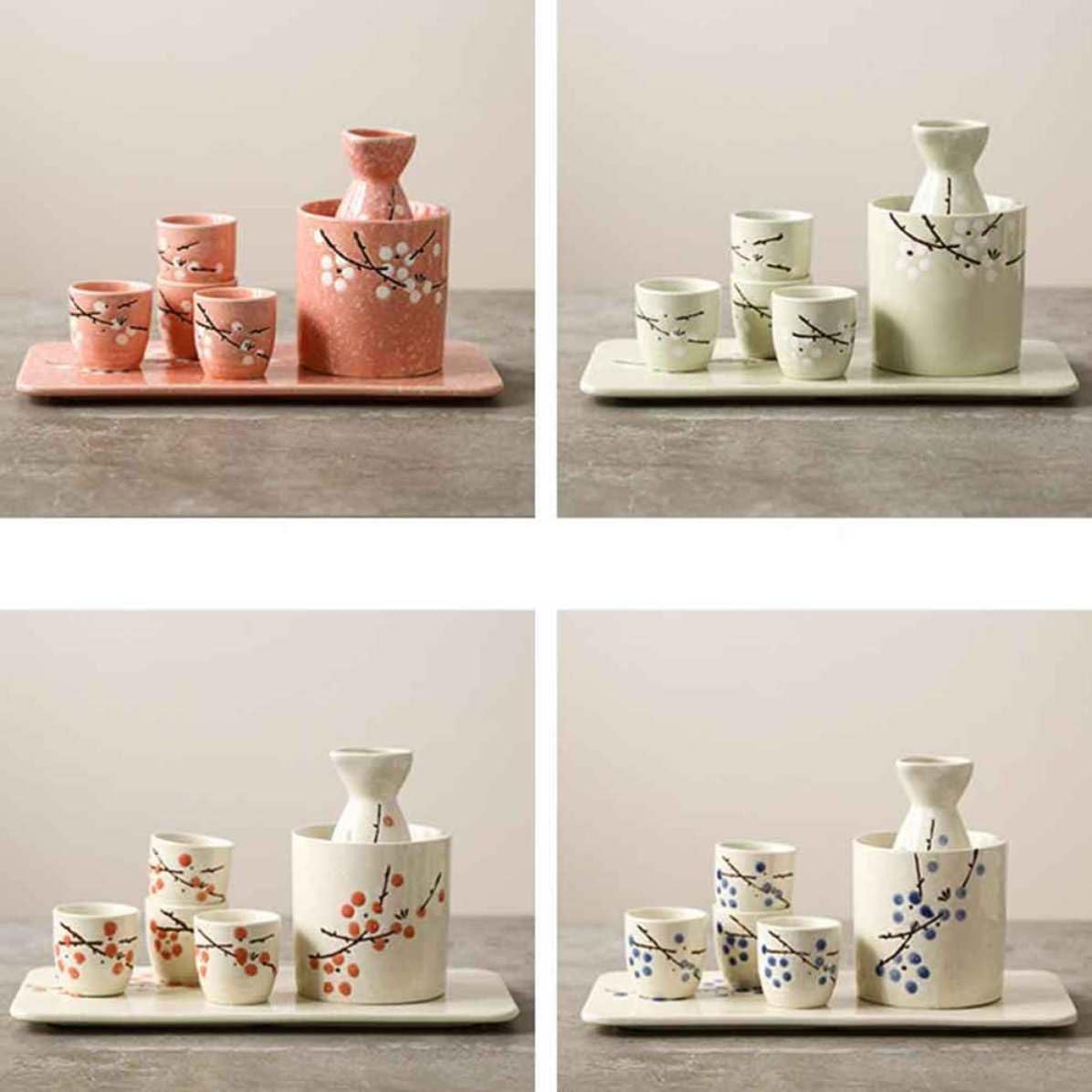 Japanisches Sake Satz mit Sakebecher, Sakeflasche und Wärmetopf