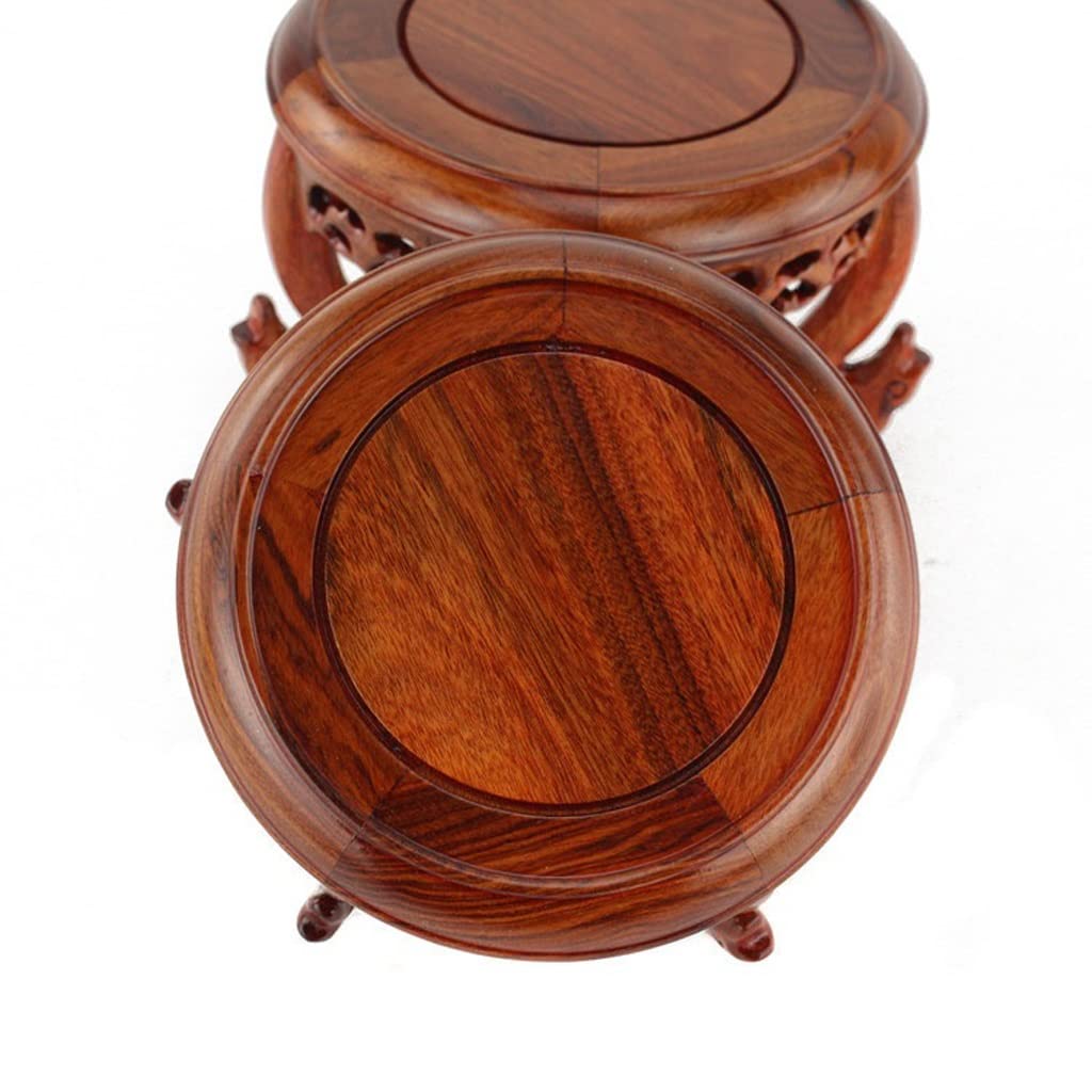 Een houten vintage plantentafel etagère met drie plateaus Een houten vintage plantentafel etagère met drie plateaus