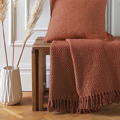 Grande couverture décorative orange à pompons pour sofa