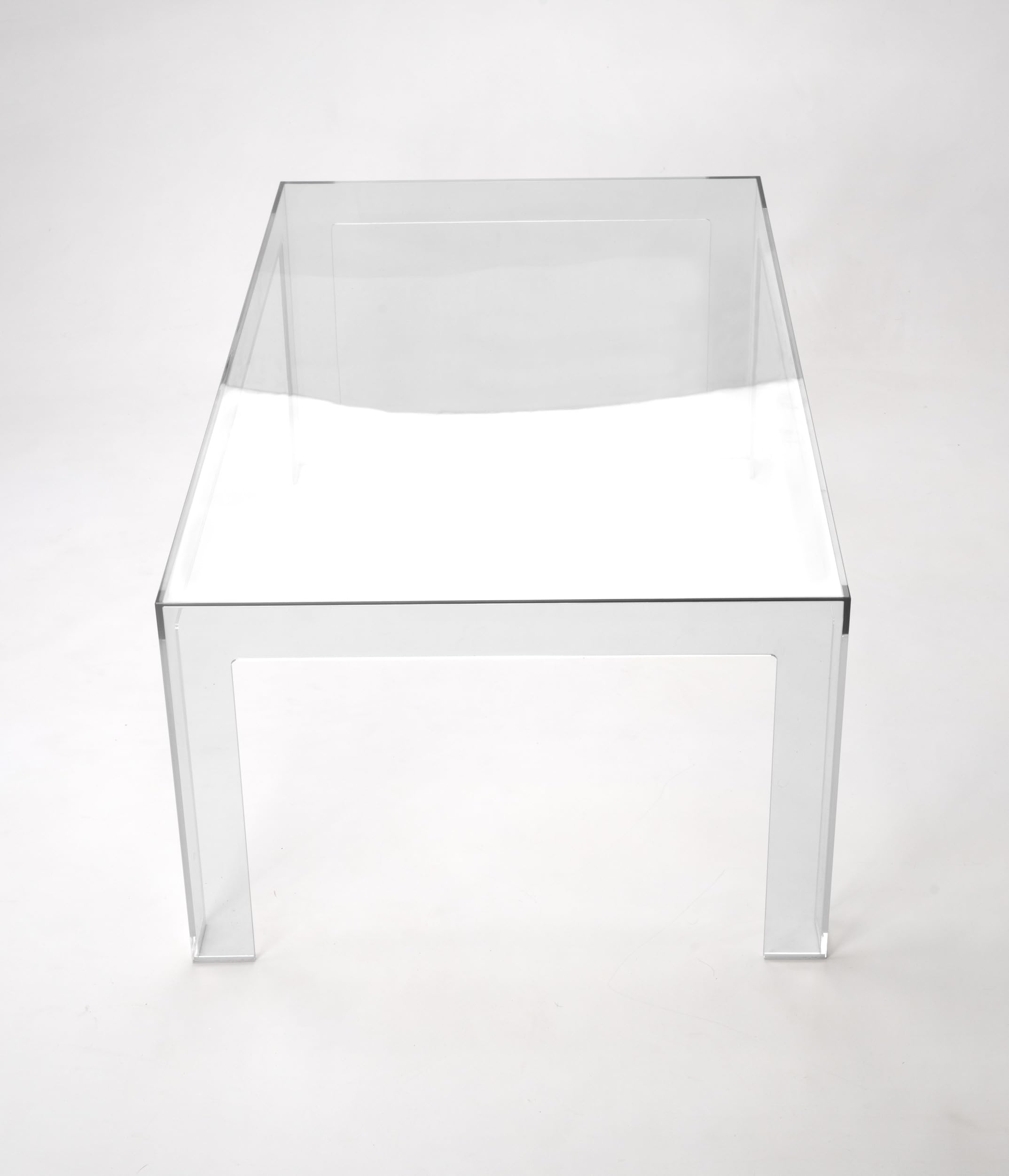 Tavolino da salotto trasparente in policarbonato monoblocco, design moderno, Made in Italy.
