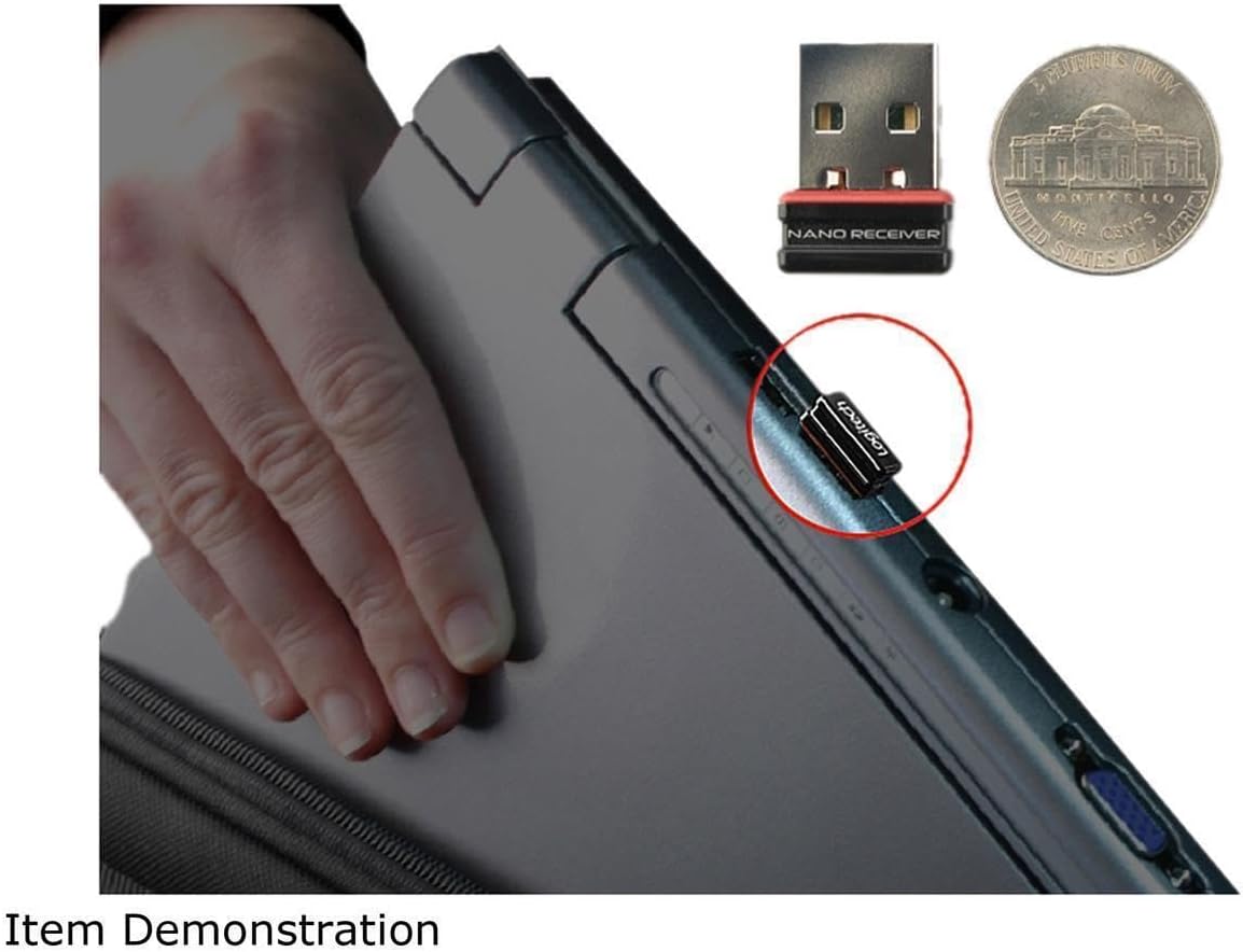 Logitech nano receiver plugged into the USB port of a laptop.