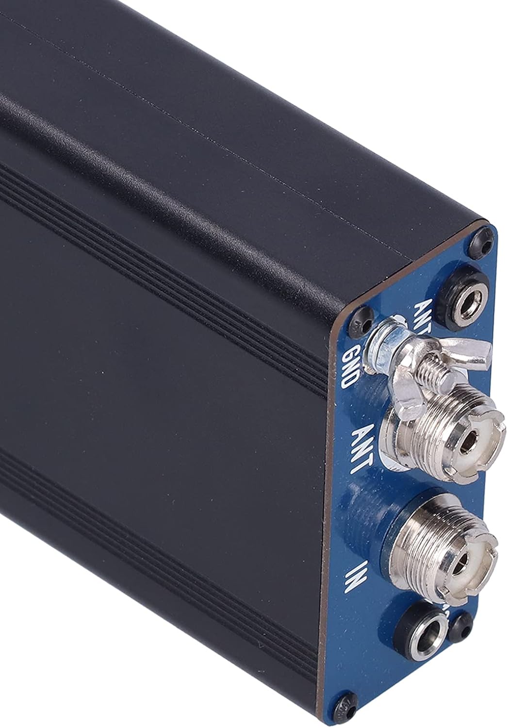 Close-up view of the ATU-120 tuner's input and output ports, including ANT, GND, IN, and DC 12V.
