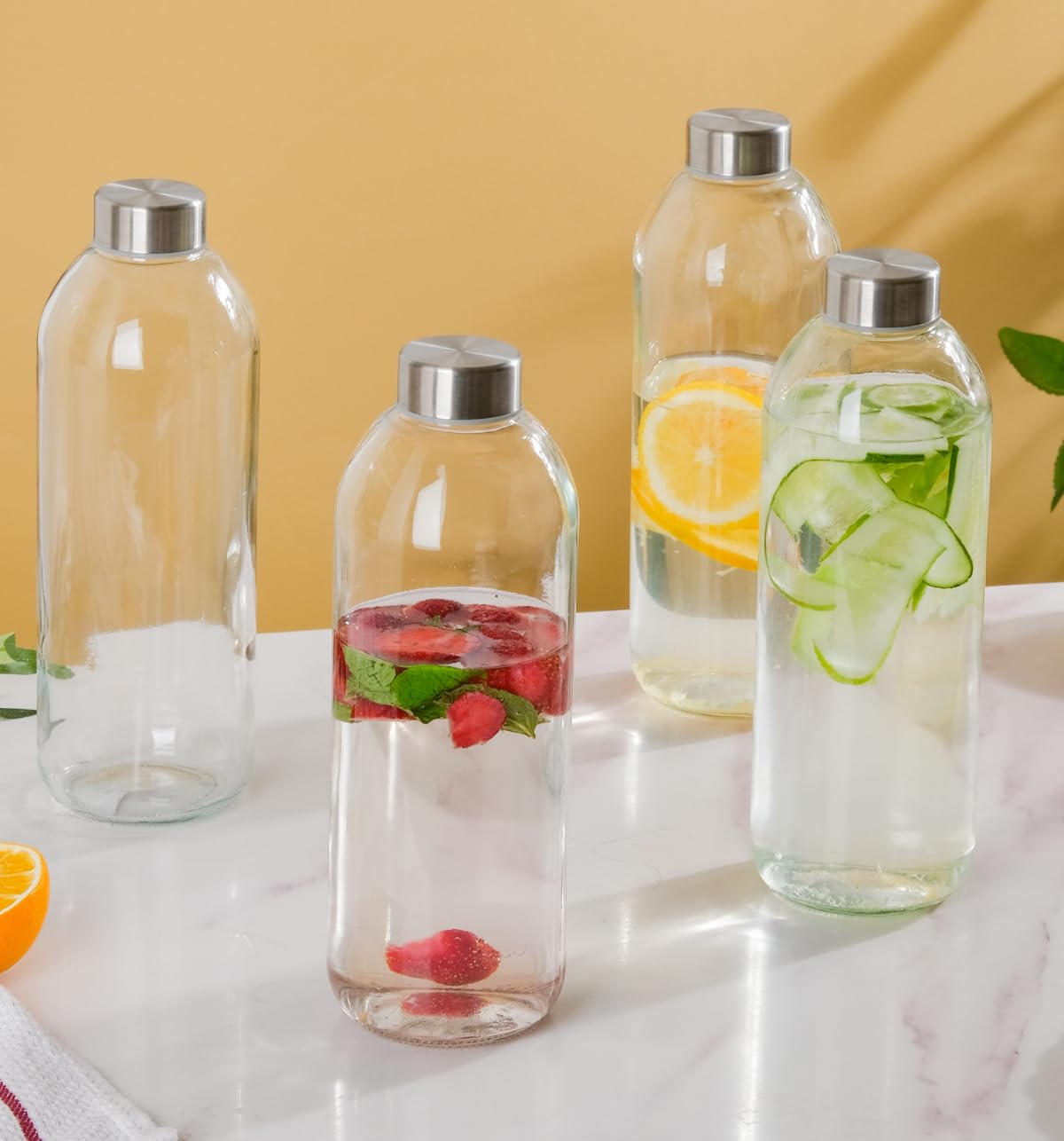 Nestasia Borosilicate Glass Water Bottle Set of 4 | Transparent Leak Proof Bottles with Plastic Cap for Fridge | For Shakes, Smoothies, Water, Milk, Juice, Cocktail | 1 Litre each
