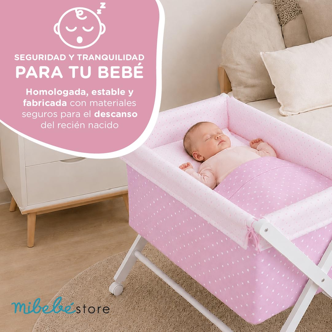 mibebestore Minicuna de Tijera Plegable de Madera con Ruedas y Frenos – Incluye Colchón, Colcha, Almohada y Textil 100% Algodón – hasta 9 Meses – Blanco/Rosa