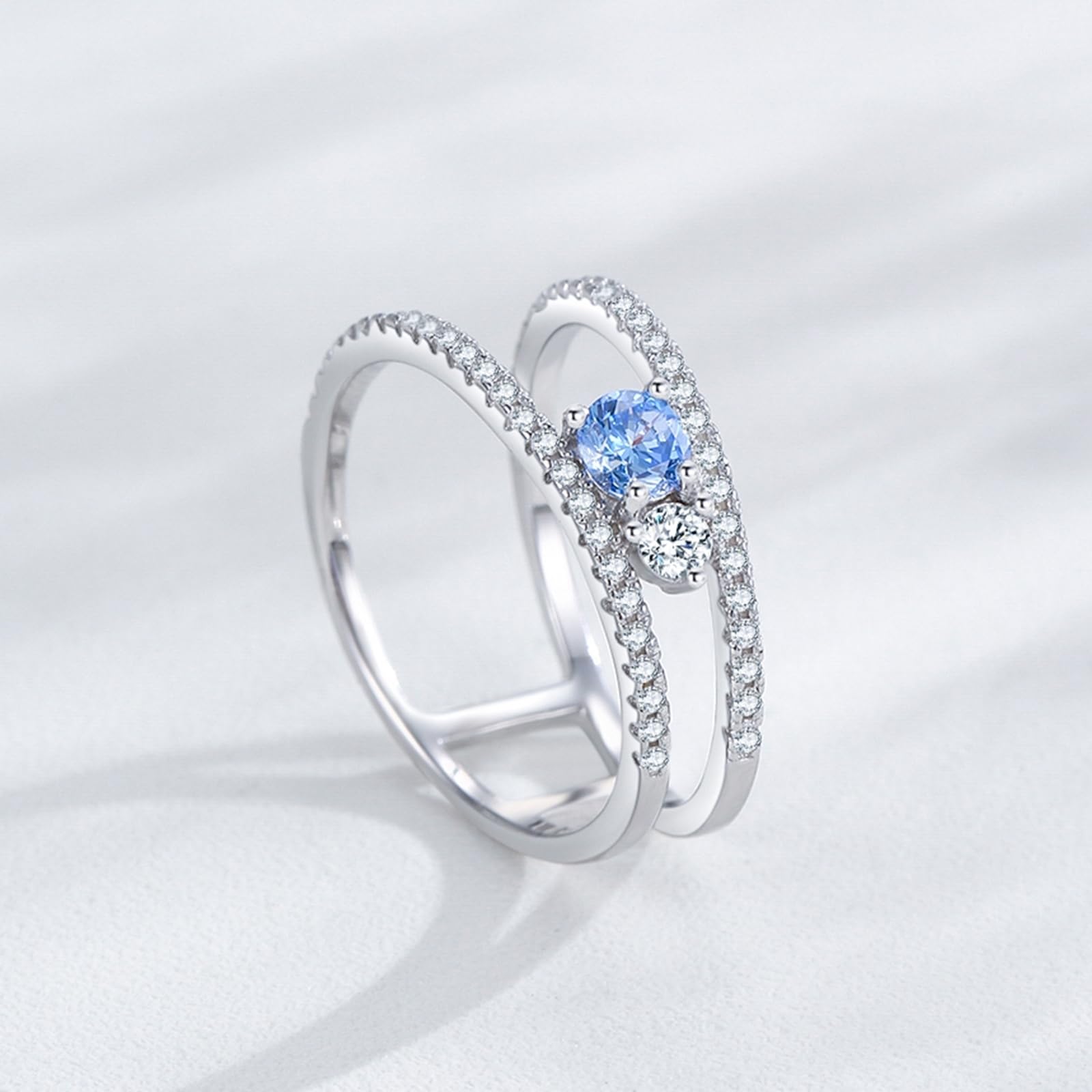 Pierścionki z białego złota 9K, pierścień 4 mm topaz niebieski 0,25 ct moissanit