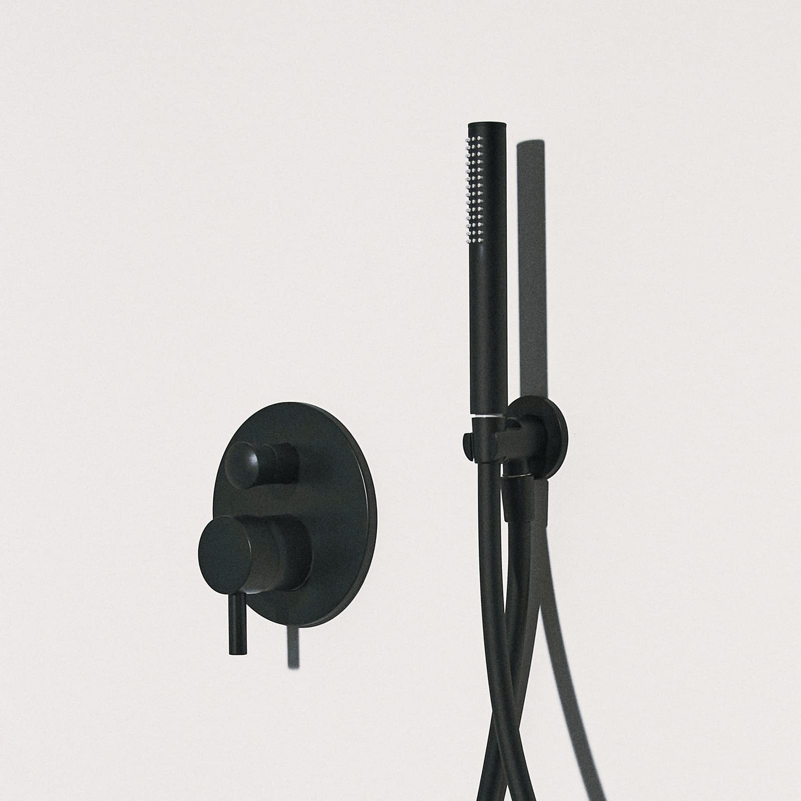 Ideal Standard - Supporto a parete fisso erogante per doccetta, Nero Seta
