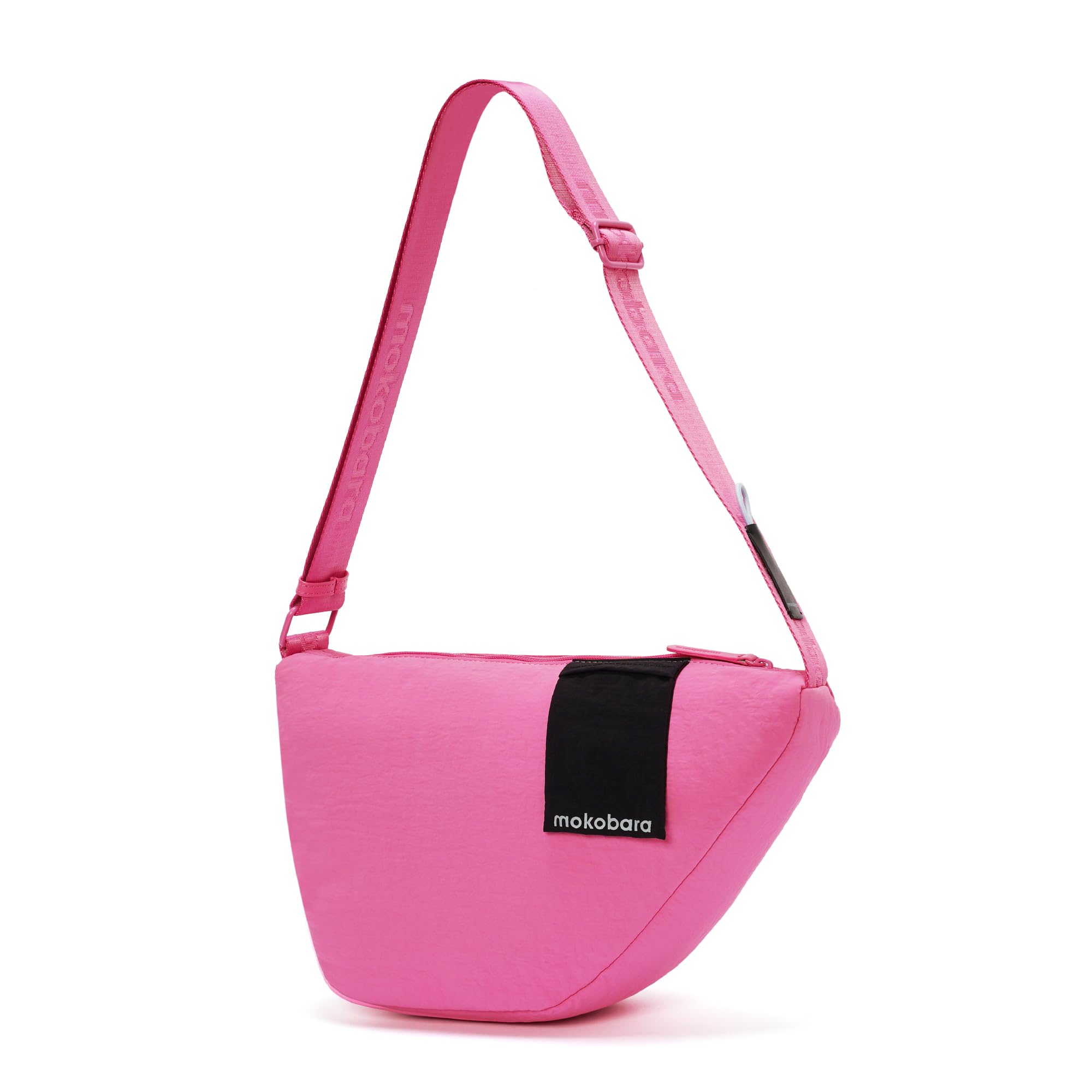 MOKOBARA The Aisle Crossbody Bag for Men & Women | 7L Lightweight Nylon Sling Pouch with Smart Organizers, AirPods Pocket & Sunglasses Loop | Hands-Free Travel & Daily Carry | Excuse me | Pink