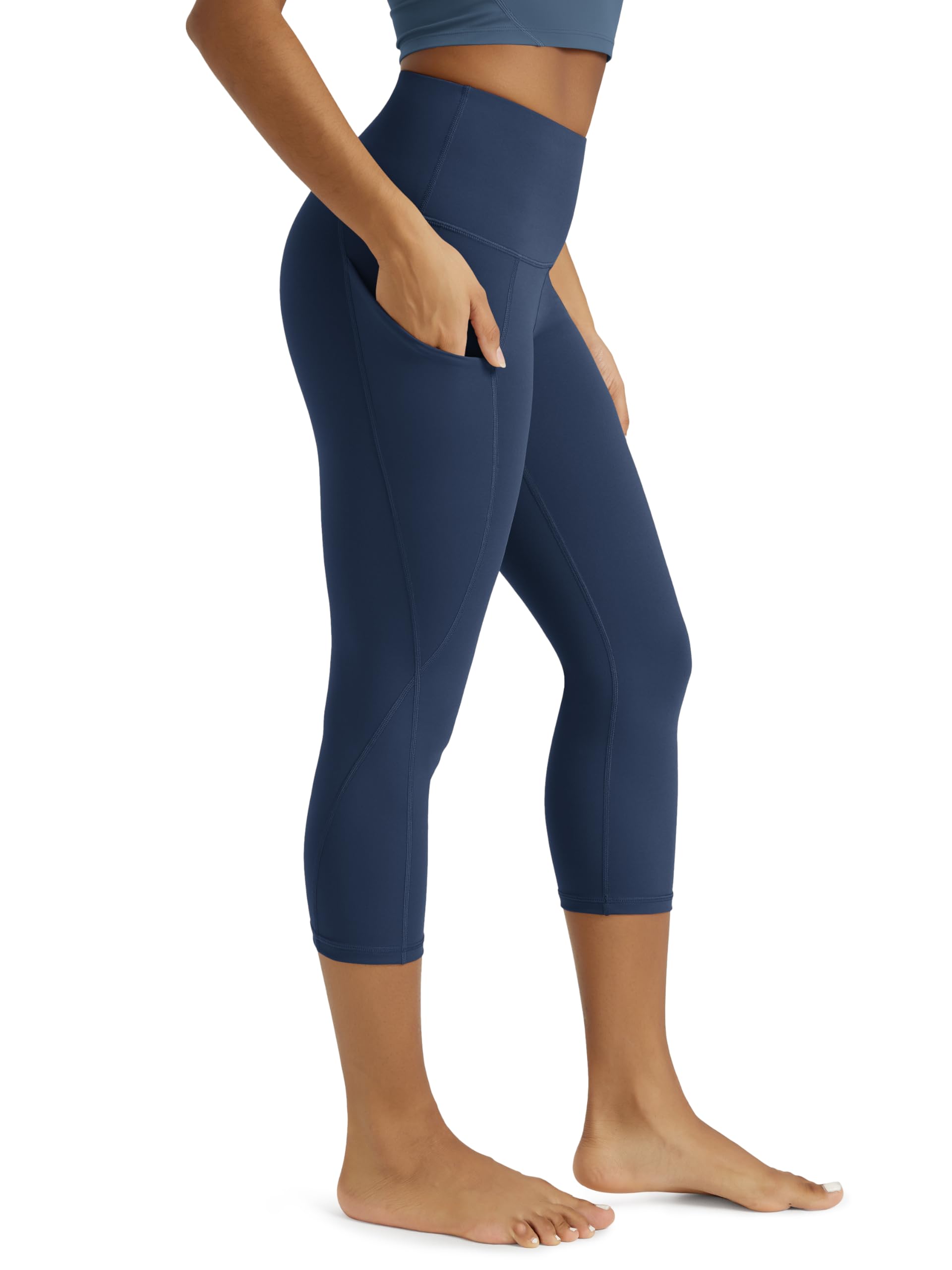 ODODOS Women's High Waisted Yoga Capris with Pockets, Tummy Control Non See Through Workout Athletic Running Capri Leggings