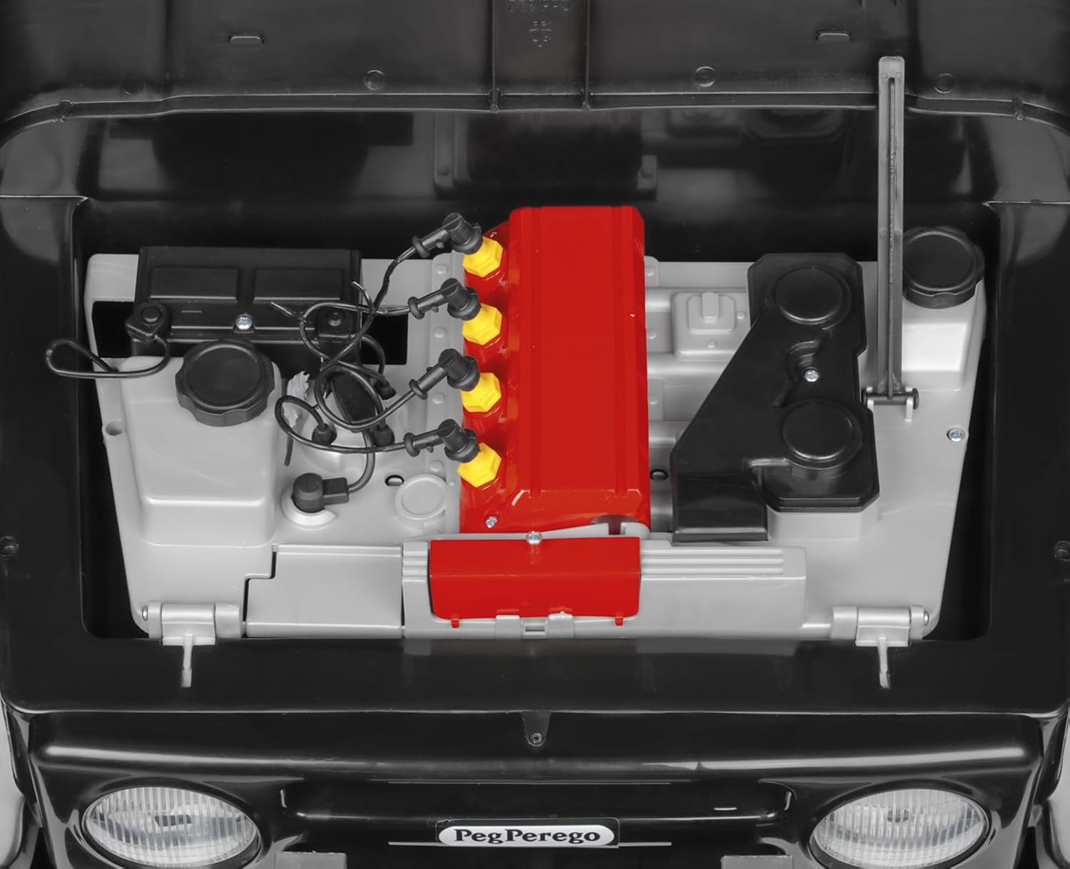 תקריב view of the engine compartment under the hood of the Peg Perego Gaucho PRO Realtree, showing internal components.
