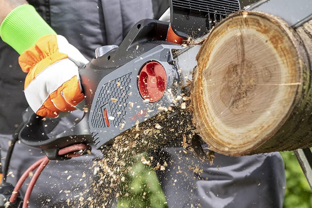 Person using IKRA KSE 2400-40 electric chainsaw to cut a log