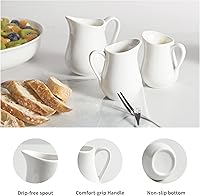 Vista 4 de Gurygo Paquete de 4 cremas blancas clásicas de 4 onzas con asa, juego de jarras pequeñas de cerámica para leche, jarra de leche pequeña de porcelana