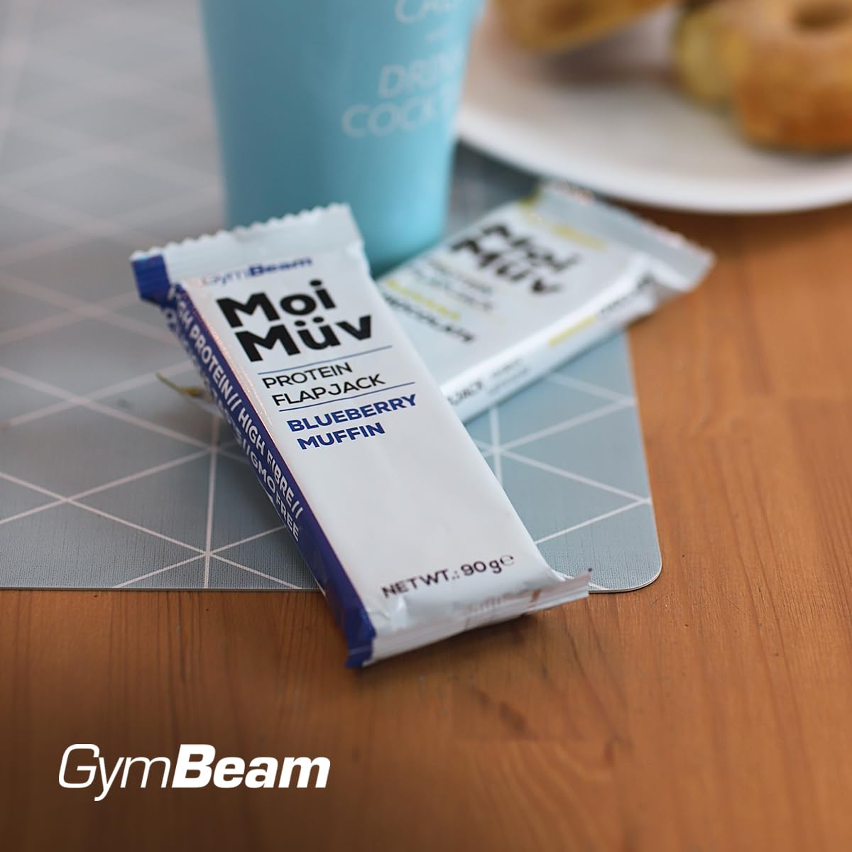 GymBeam MoiMüv Protein Flapjack - Proteinriegel mit 20g Protein pro Portion, reich an Ballaststoffen, hervorragende Kohlenhydratquelle, Proteinriegel mit Whey-Konzentrat (12x90 g, Banana Chocolate)