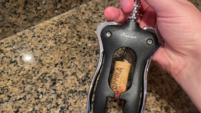 Demonstration of the wine opener with rabbit wing corkscrew