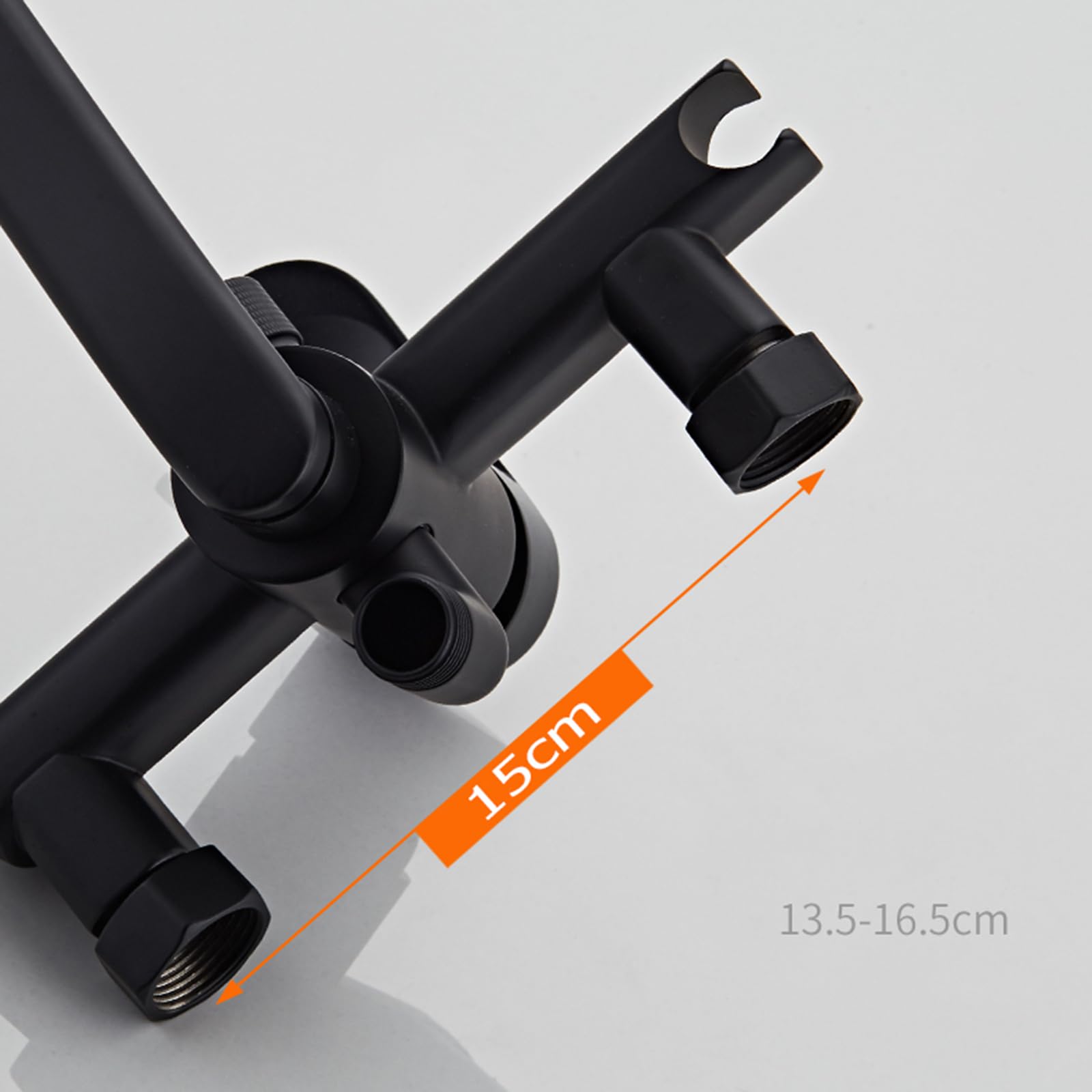 Czarny ścienny kran kuchenny z obrotowym pistoletem natryskowym o 360° podwójna funkcja ciepła i zimna woda 20 cm długość wylewki nowoczesny design dla łatwego użytkowania