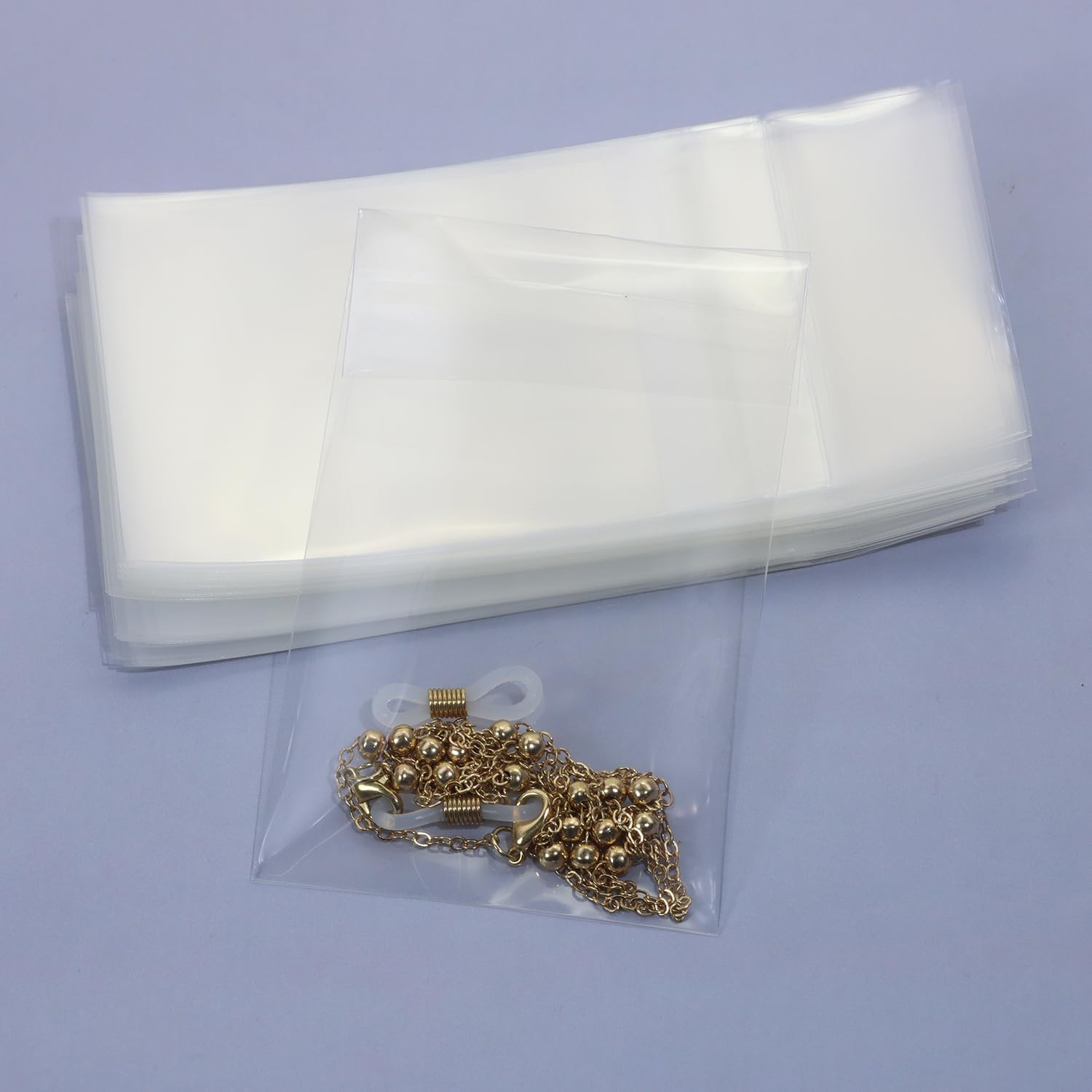 ONLYKXY 50pcs Soft Clear Plastic Small Bag Self Adhesive Storage Pouch Sleeve Cover Pocket Holder Photo Protector for Collectible Coin Jewelry Craft Sport Trading Card,61x94mm image 5