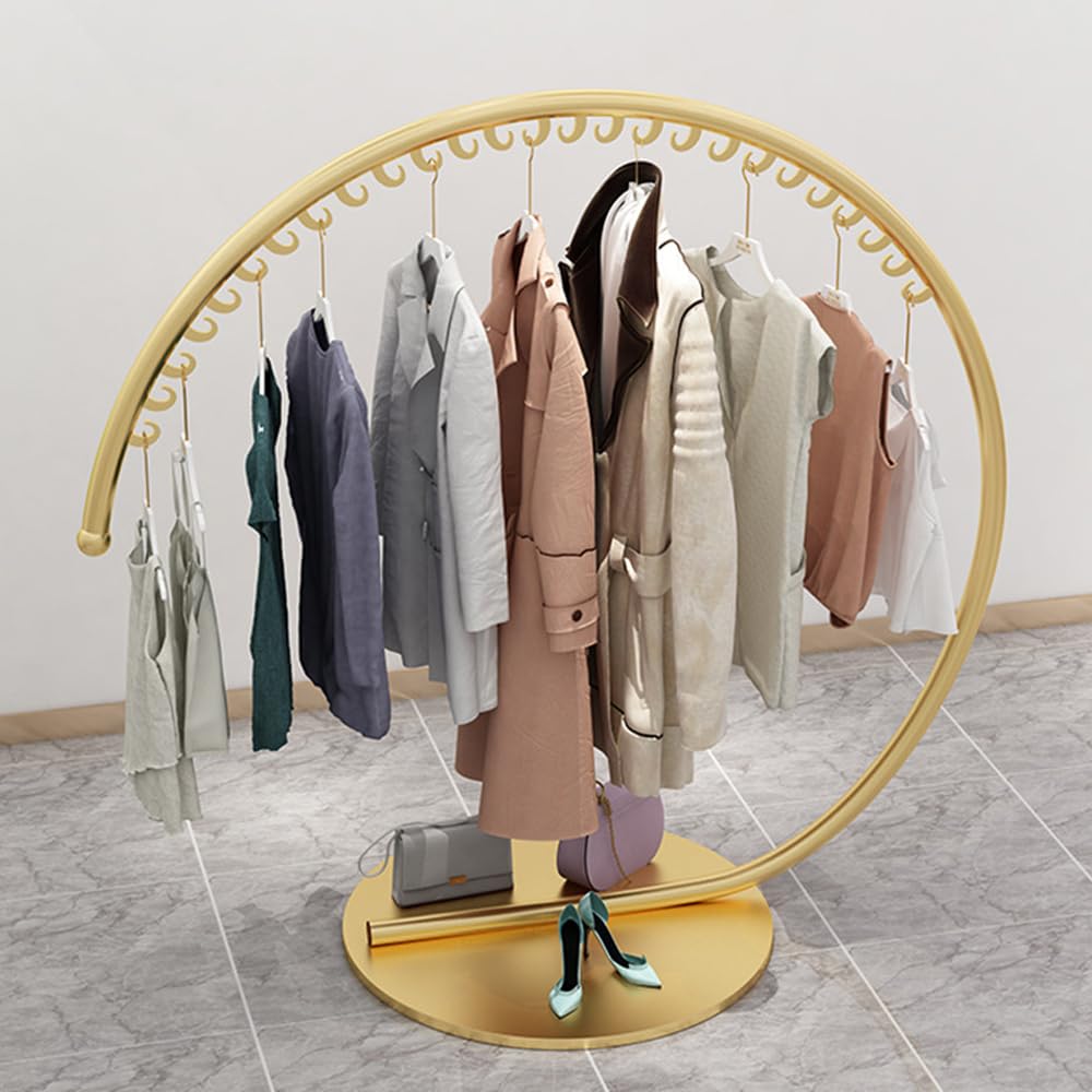 Portant à vêtements doré robuste et élégant en métal brillant pour magnifier votre dressing