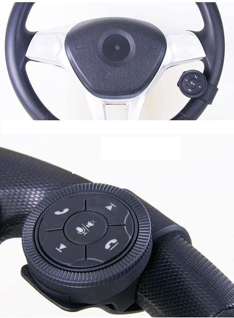 Wireless steering wheel control button mounted on a car steering wheel.