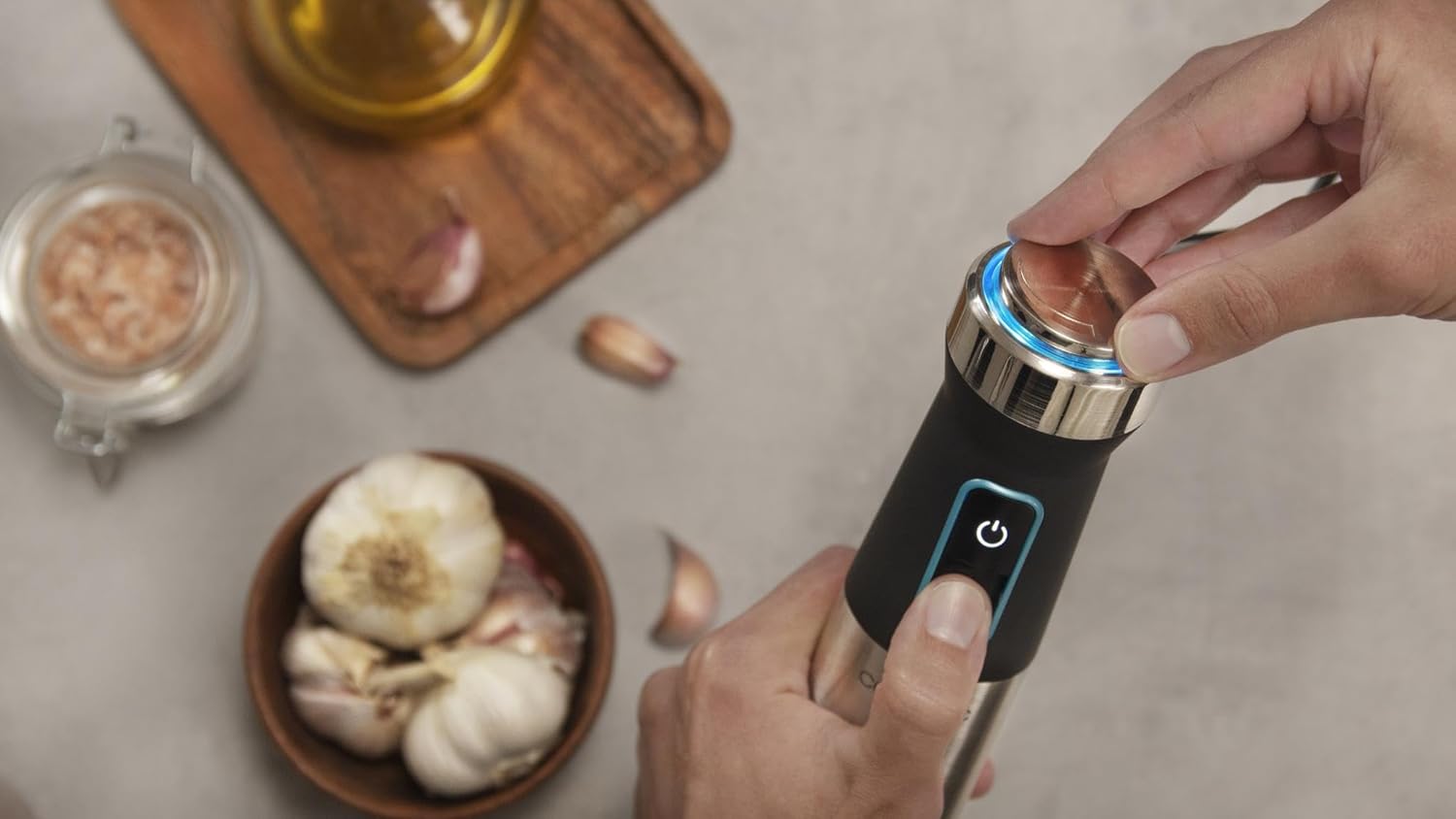 Close-up of the Cecotec Power TitanBlack 1500 XL Immersion Blender's control panel with power and speed buttons