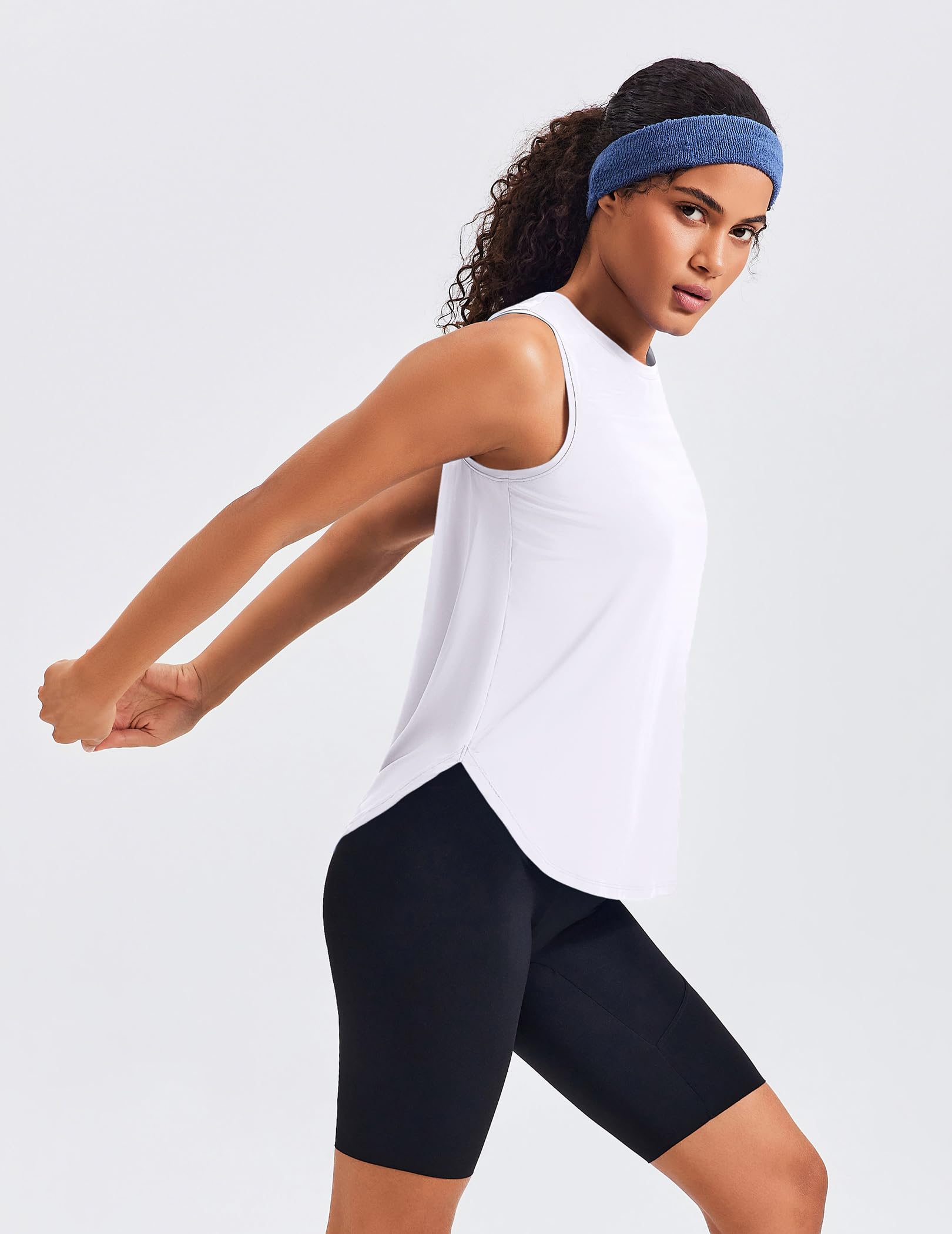 Close-up of the PINSPARK Women's Workout Tank fabric texture and back pleat detail.