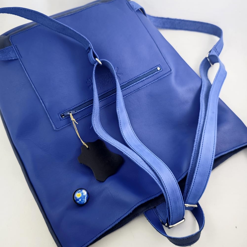 Mochila bolso antirrobo de piel azul.