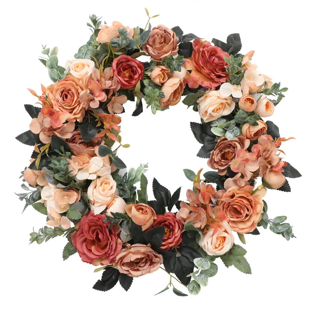 Couronne d'automne pour porte d'entrée avec citrouilles et feuilles d'érable