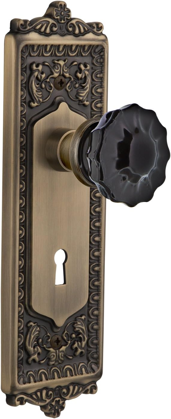 Nostalgic Warehouse 726810 Egg & Dart Plate with Keyhole Passage Crystal Black Glass Door Knob in Antique Brass, 2.75