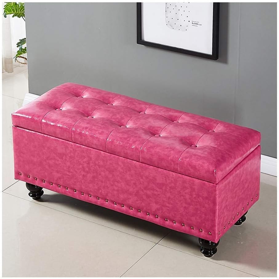 Bout de lit coffre rose en velours pour ranger les coussins de chambre