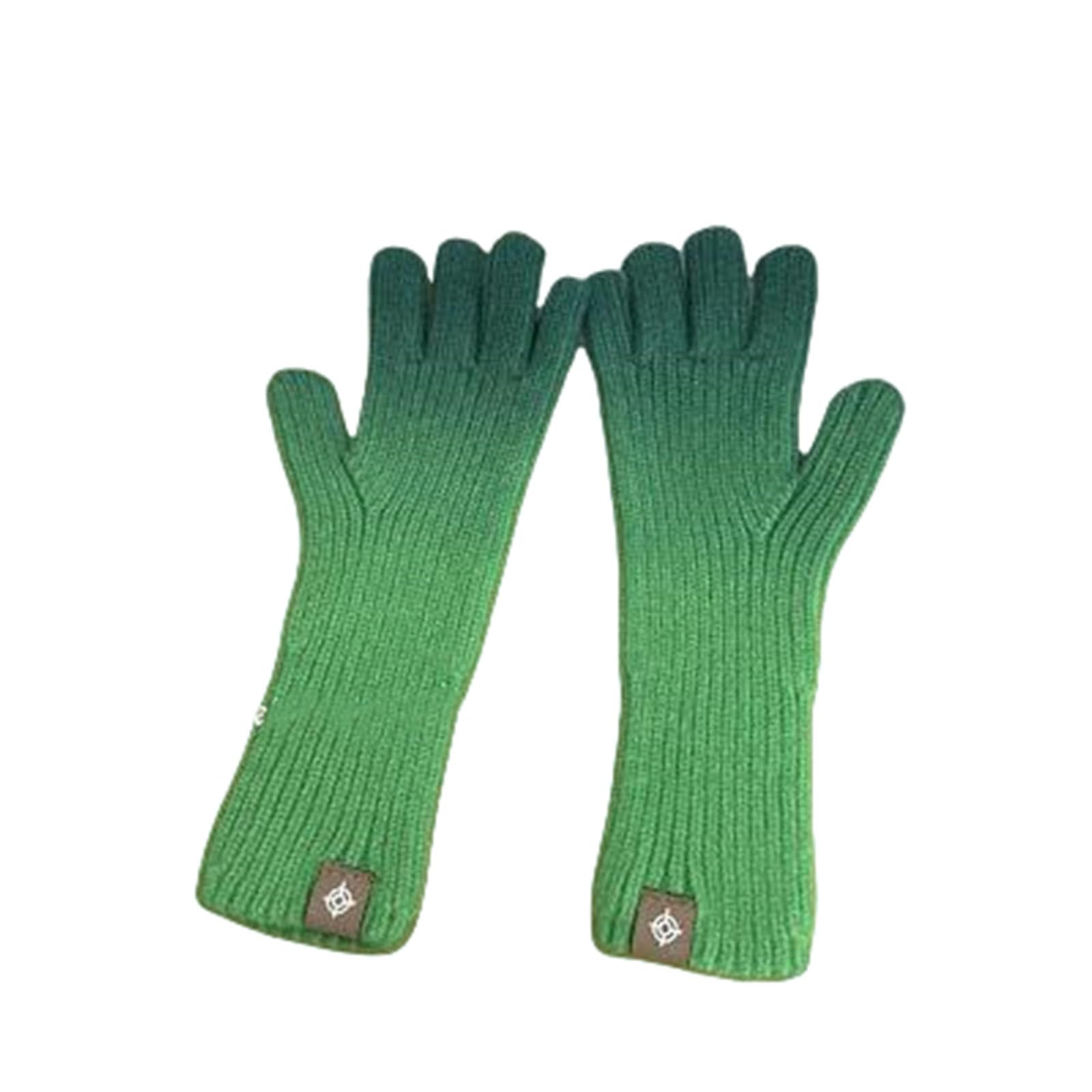 Guantes de punto sin dedos ideales para paseos urbanos de invierno en verde