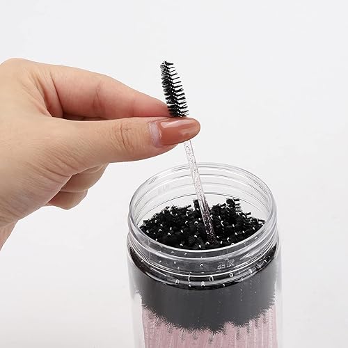 Vista 46 de 100 varitas de rímel desechables, cepillo de carretes de cejas de cristal para extensiones de pestañas, cepillos de pestañas rosas con contenedor