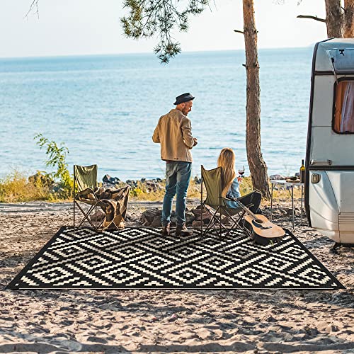 Image of GENIMO Outdoor Rug 4'x6' Waterproof, Reversible Camping Mat, Plastic Straw Rugs for Patio, RV, Camper, Balcony, Backyard, Picnic, Deck (Black & Beige) | Outside Larger Modern Carpet Mat for Porch Decor, Deck, Balcony, Camping, RV, Backyard, Picnic, Beach, Reversible, Foldable
