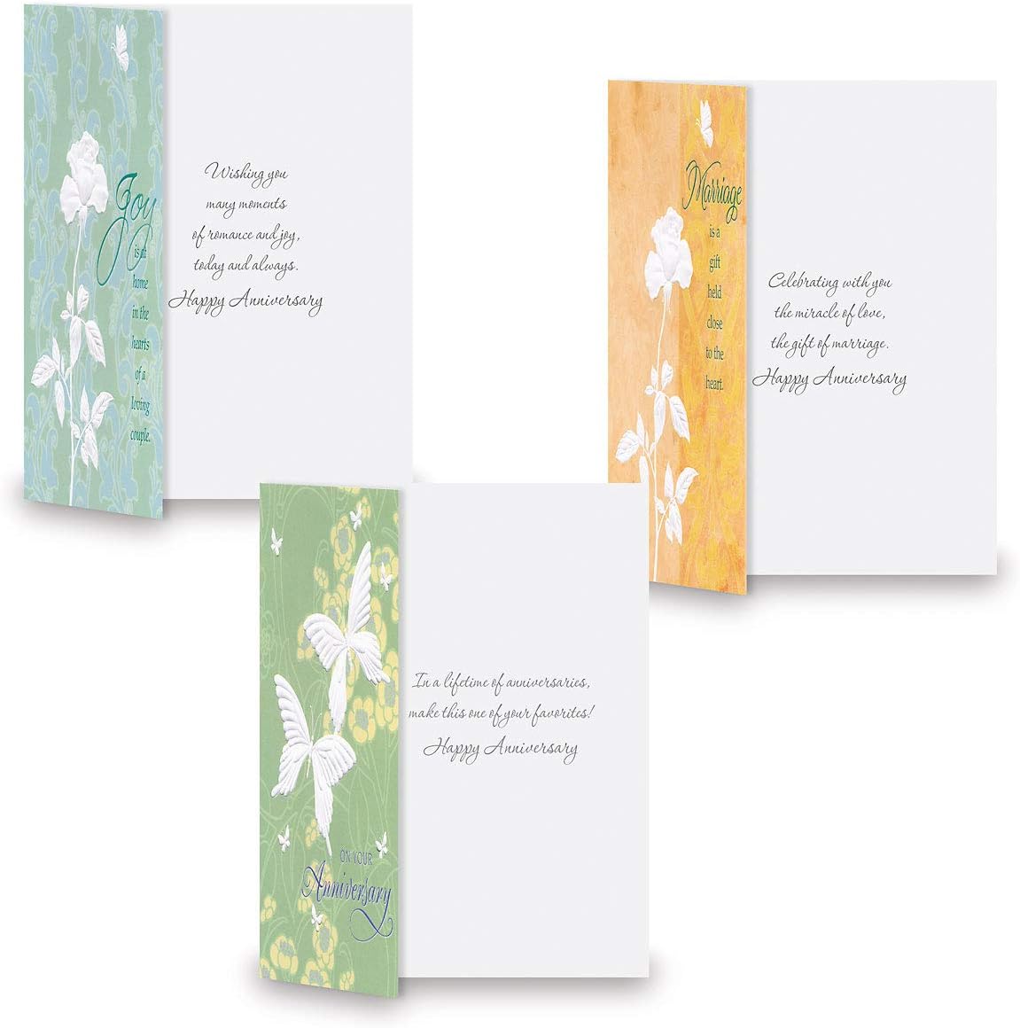 Dins view of three anniversary cards showing pre-printed sentiments.