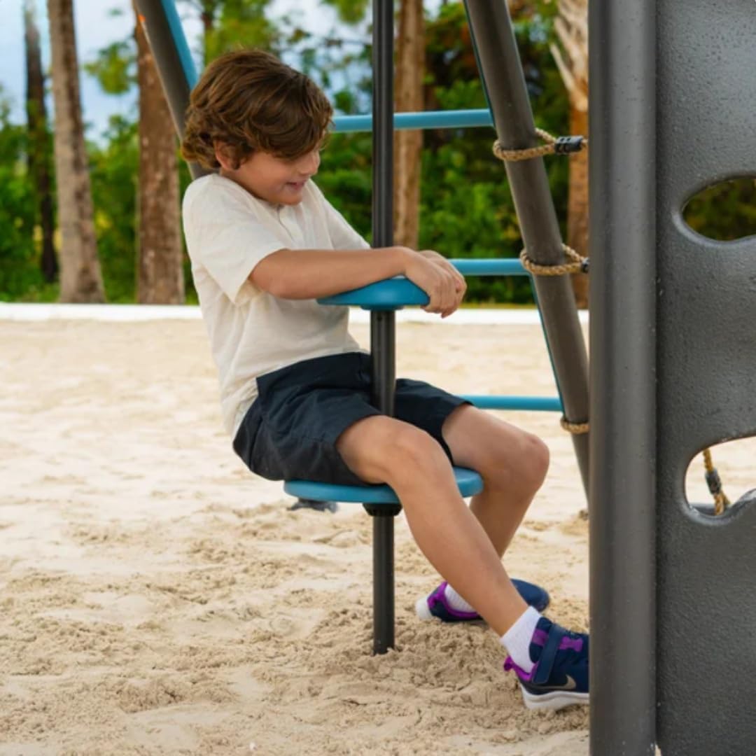 A child sitting on the mini go-round swing feature of the Lifetime 91382 playset.