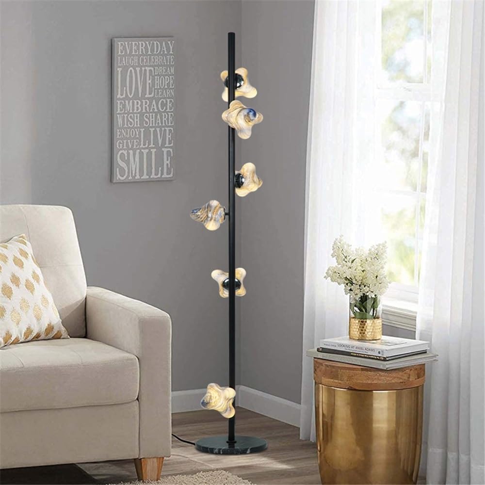 Lampa stojąca Niebieska szklana lampa stojąca obok sofy w salonie i złota żelazna stołowa przy łóżku sypialni