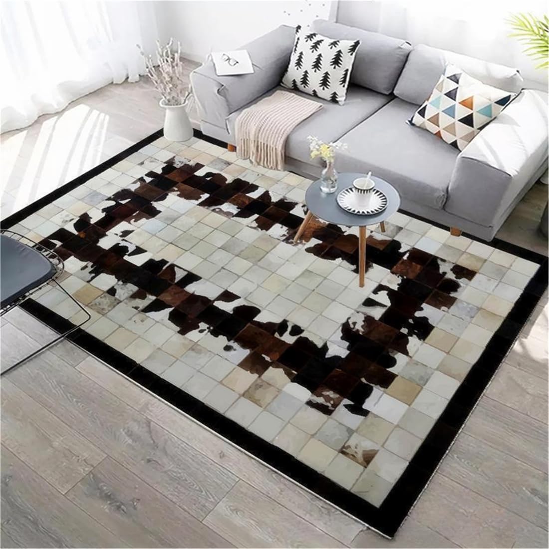 Tapis géométrique noir doux 100x160 cm idéal pour habiller un canapé ou hall d'entrée