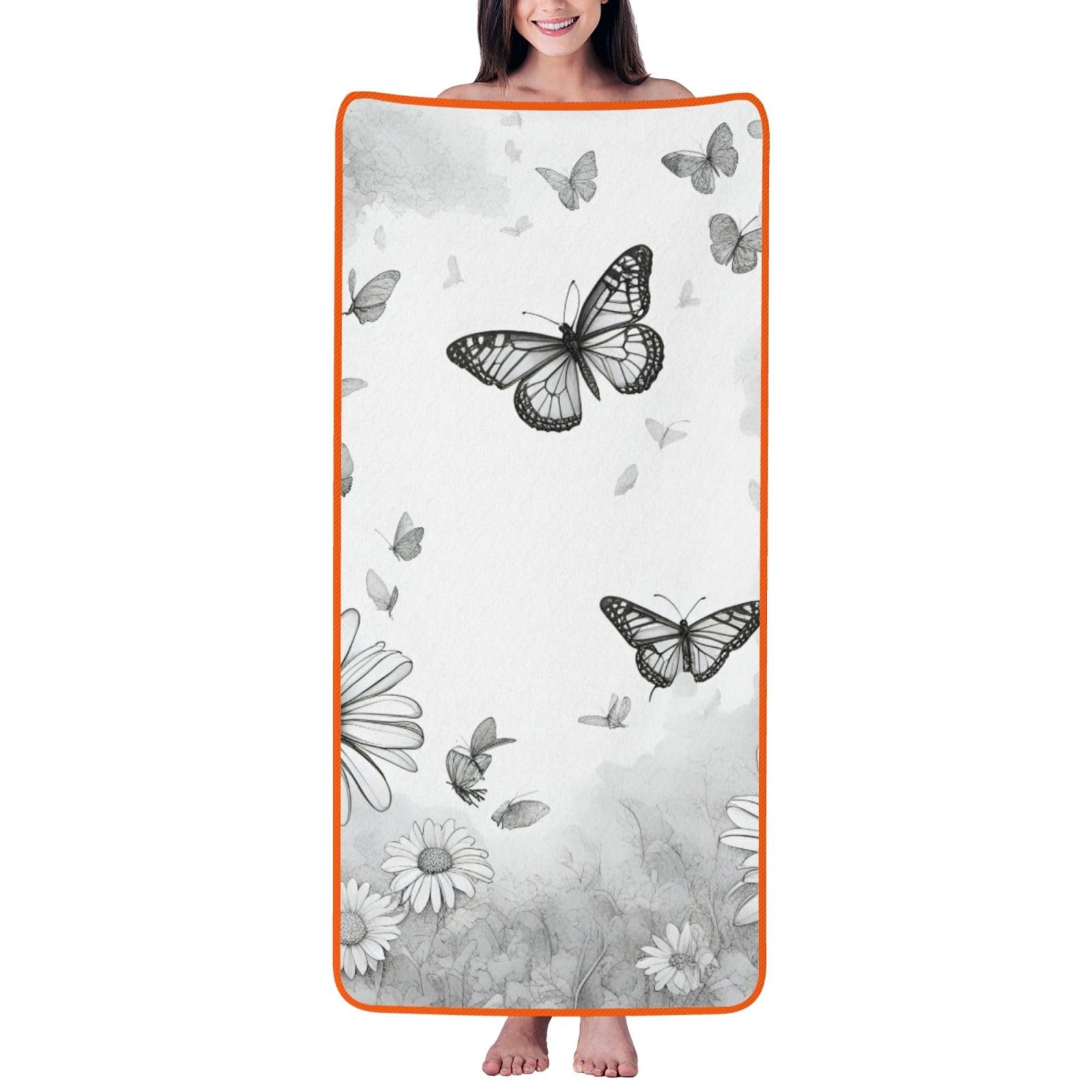 Serviette velours corail marguerite : une bulle de douceur et de fraîcheur pour votre bain