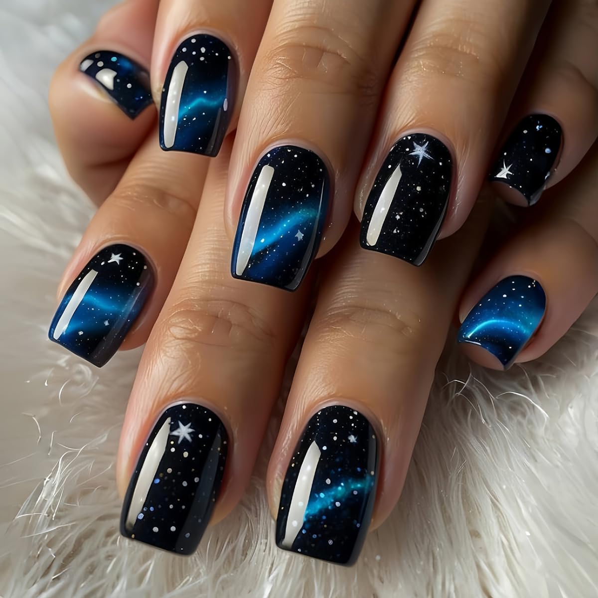 Photo 1 of YIHONGYAN Blue Press on Nails Medium Square Spring Artificial Acrylic Nail Art Kit Fake Nails Press ons Nail Tips Full Cover False Nails Black Starry Sky Stick on Nails Kit for Women 24Pcs