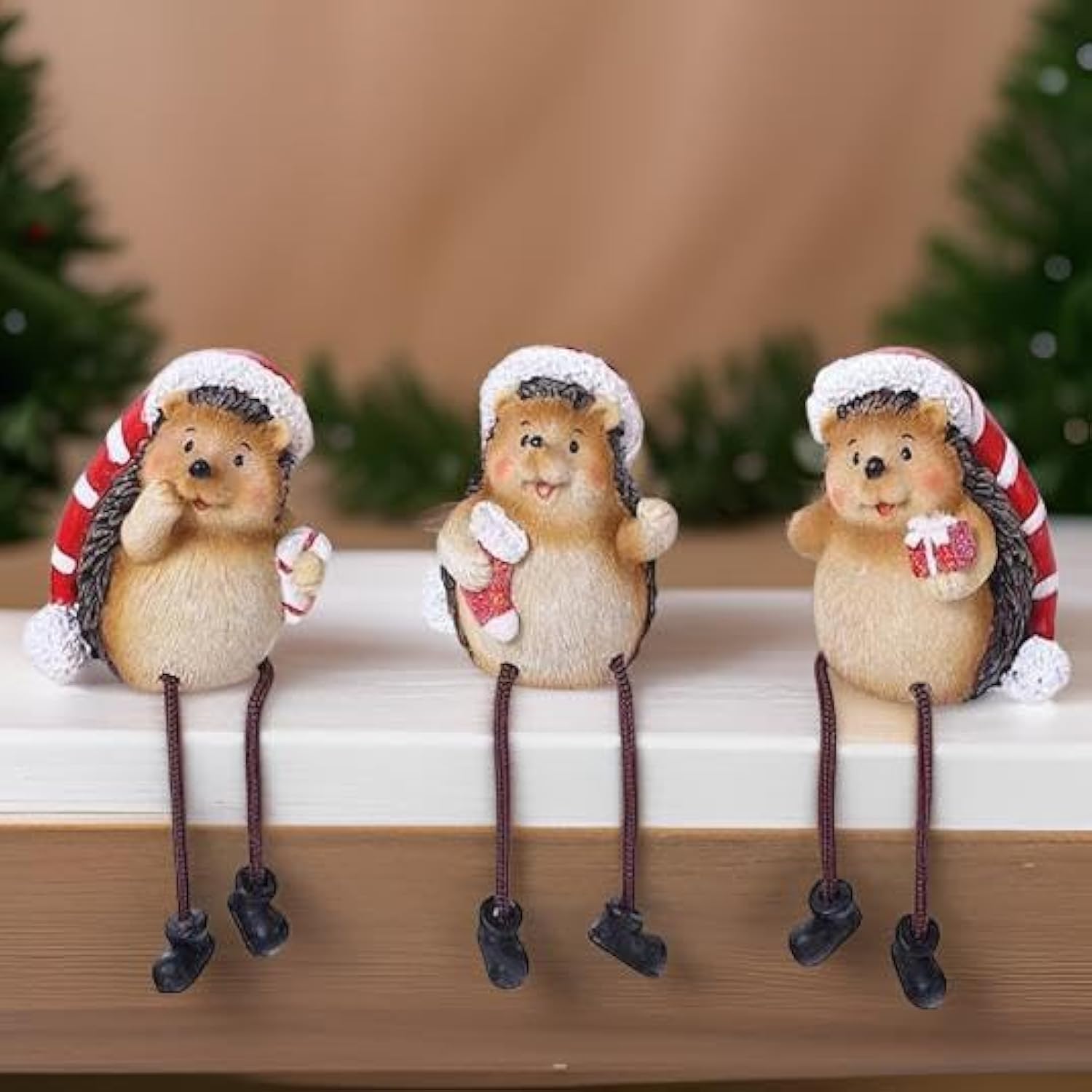 The Bridge Collection Holiday Hedgehog Figurines - Set of 3 - Tabletop Figurines for Holiday Decor - Cute Christmas Animal Hedgehog Shelf Sitters with Dangling Legs and Santa Hats