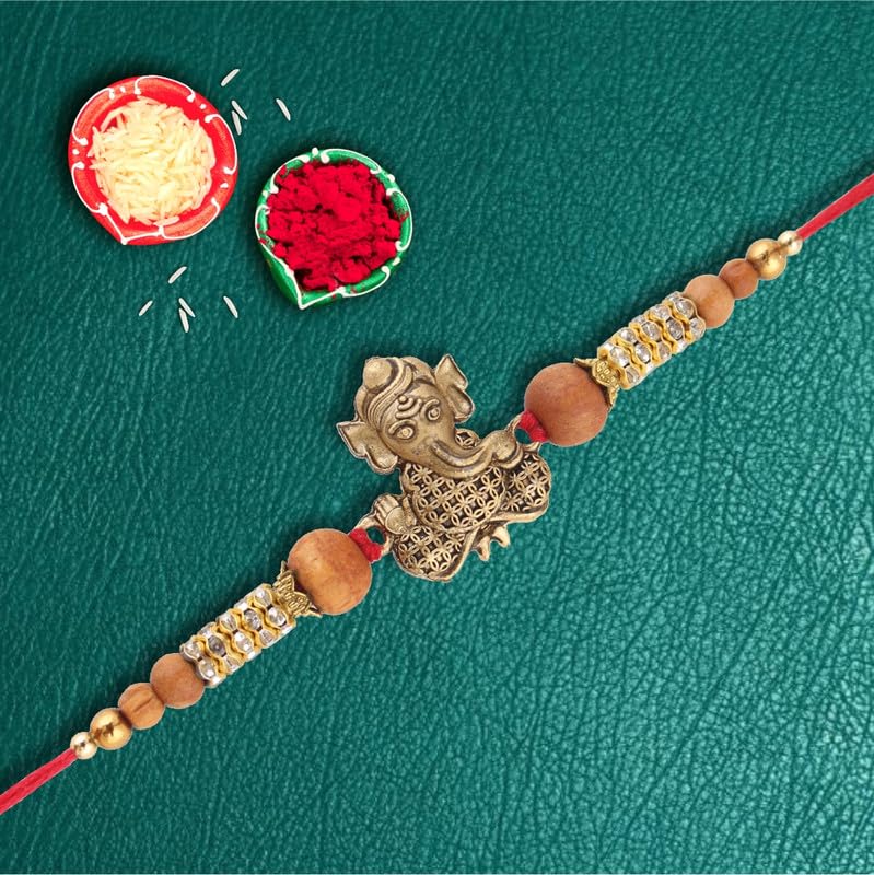 Image of Sniecker Chocolate with Cute Bal Ganesh Rakhi | Raksha Bandhan Gift Set with Rakhi, Roli Chawal & Chocolate | 21