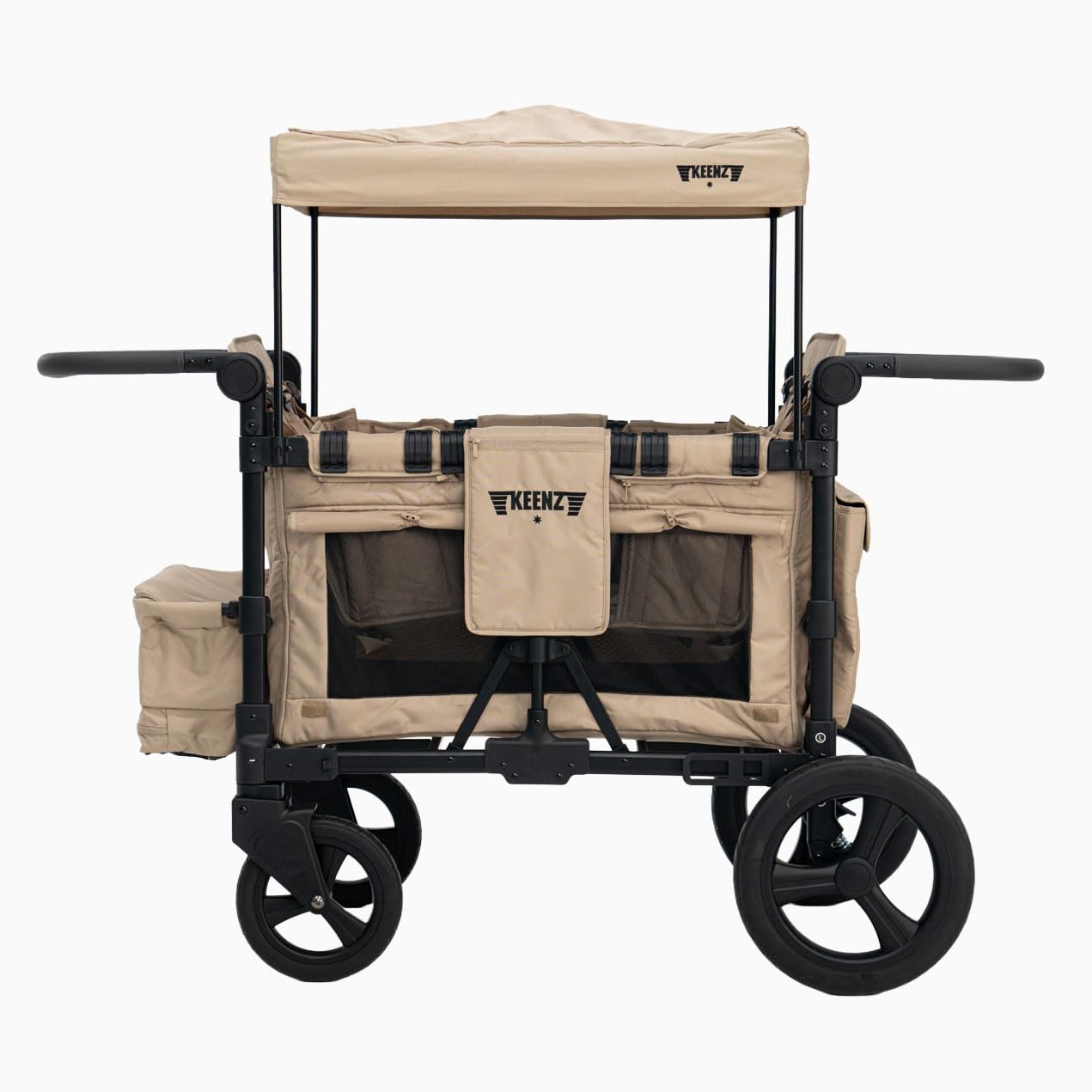 Keenz MOOV 4-Passenger Stroller Wagon in Mocha color, shown with two children inside and a family standing nearby in an outdoor setting.