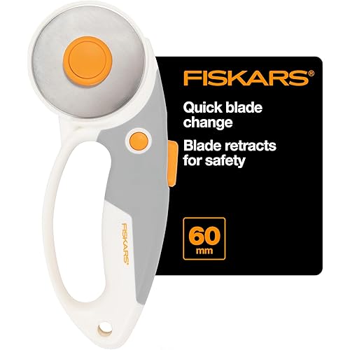 Fiskars 60mm Rotary Cutter for Fabric with Ergonomic Loop Grip And Comfort Handle, Titanium Rotary Fabric Cutter for Thick Materials, Easy and Safe Blade Change, Sewing Supplies and Quilting Tools