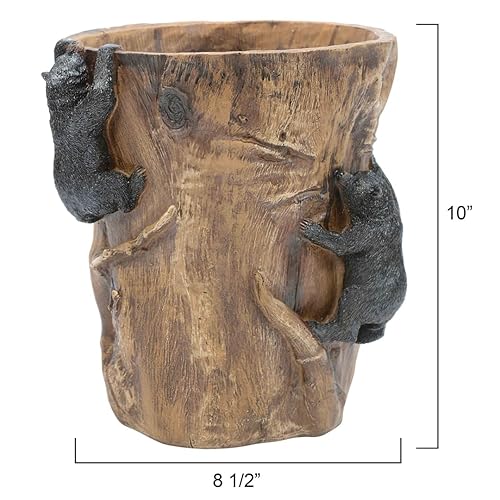 Cesta de basura de osos negros escaladores