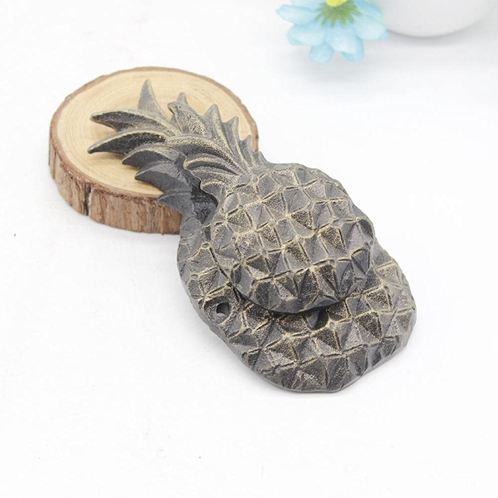 Poignée de porte ananas en fonte pour remplacer un heurtoir usé