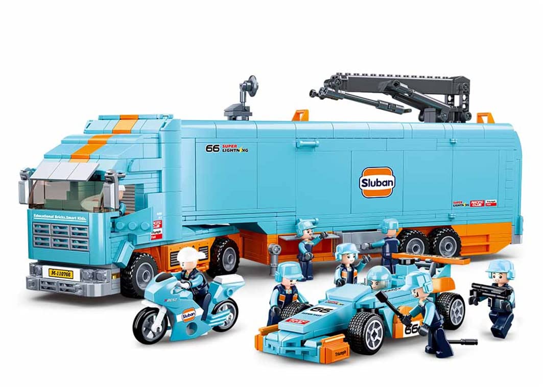 Fully assembled Sluban F1 Racing Team Truck, racing car, motorcycle, and crew minifigures.