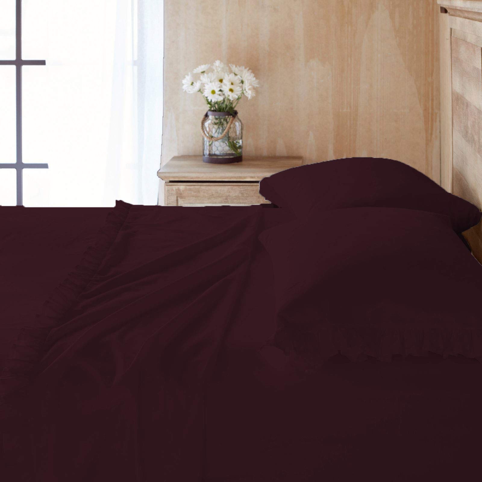 Coton égyptien 600 fils pour cette parure de lit de luxe à volants raffinés