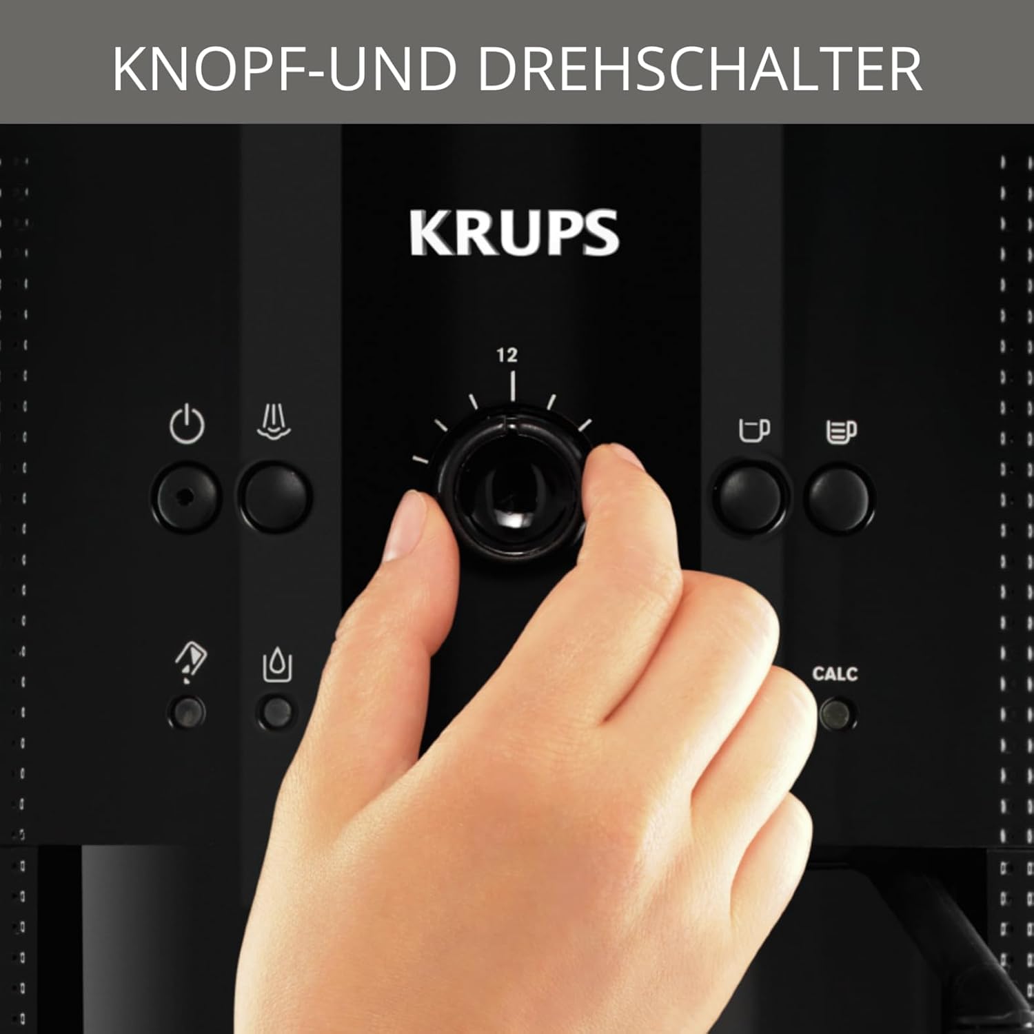 Hand adjusting the rotary control knob on the KRUPS EA8108 coffee machine