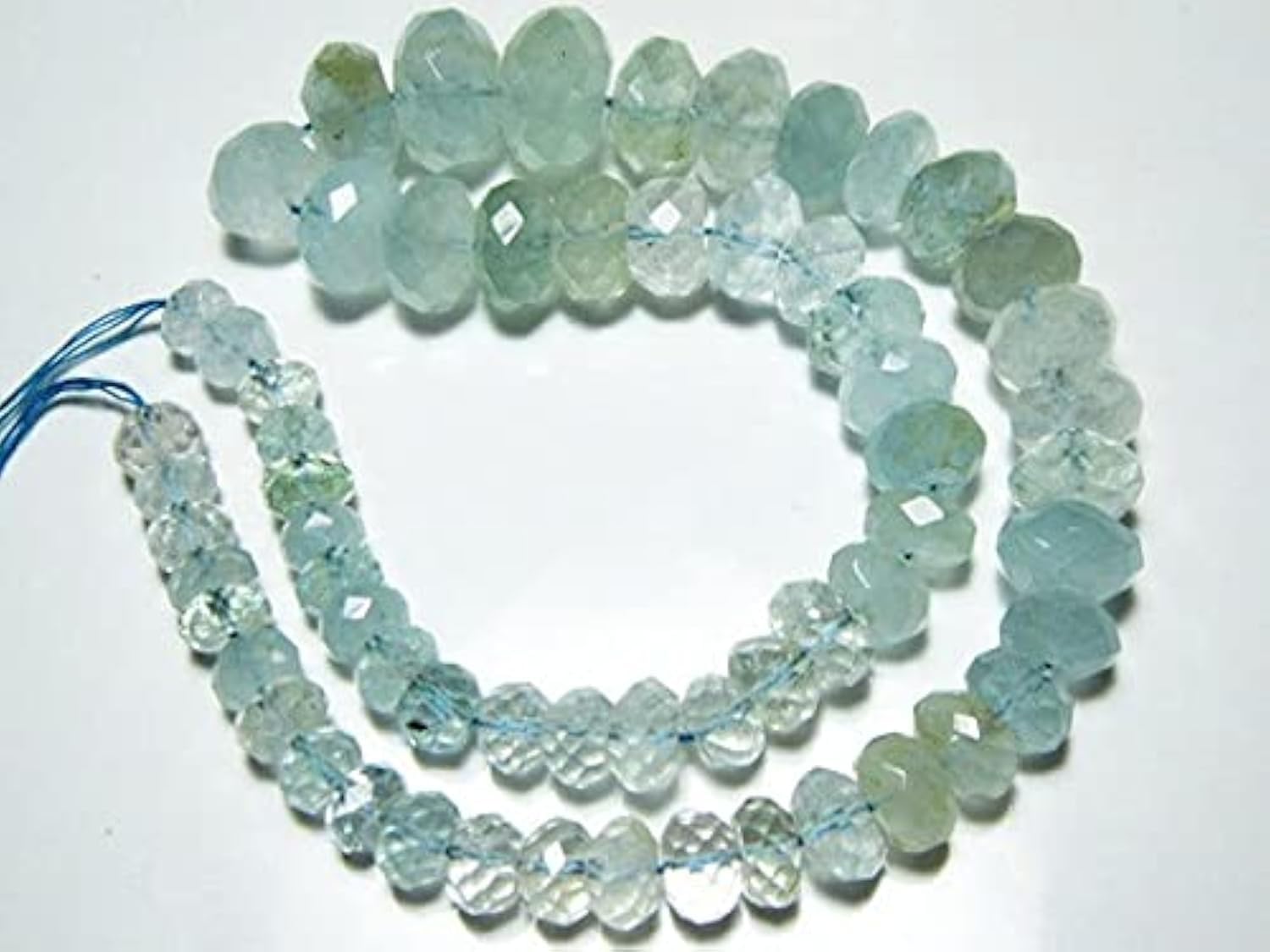 Aquamarine facettée en rondelles de 213 carats pour créer vos bijoux d'été bohème chic